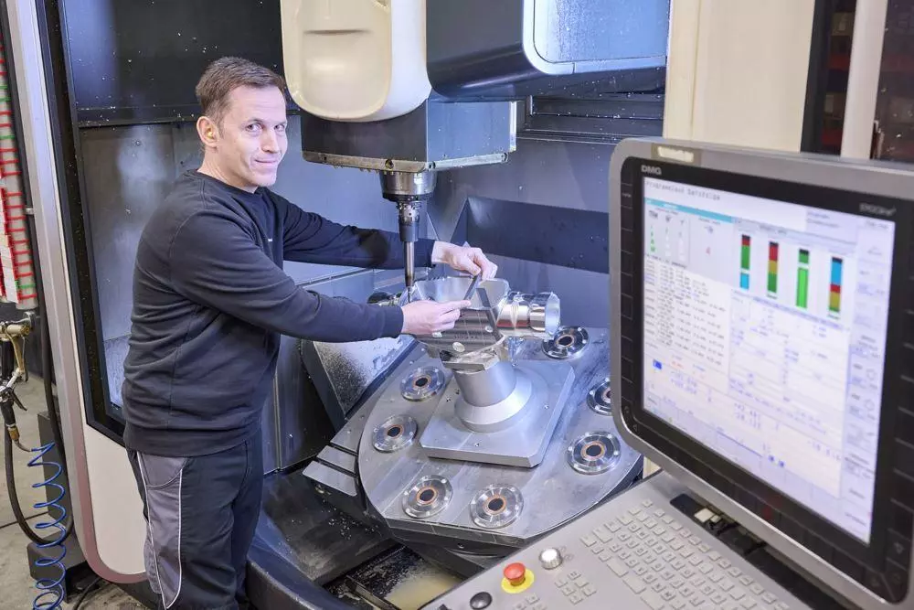 5-axis CNC machining allows the cutting tool to approach complex components from multiple directions, improving machining flexibility for precision parts.
