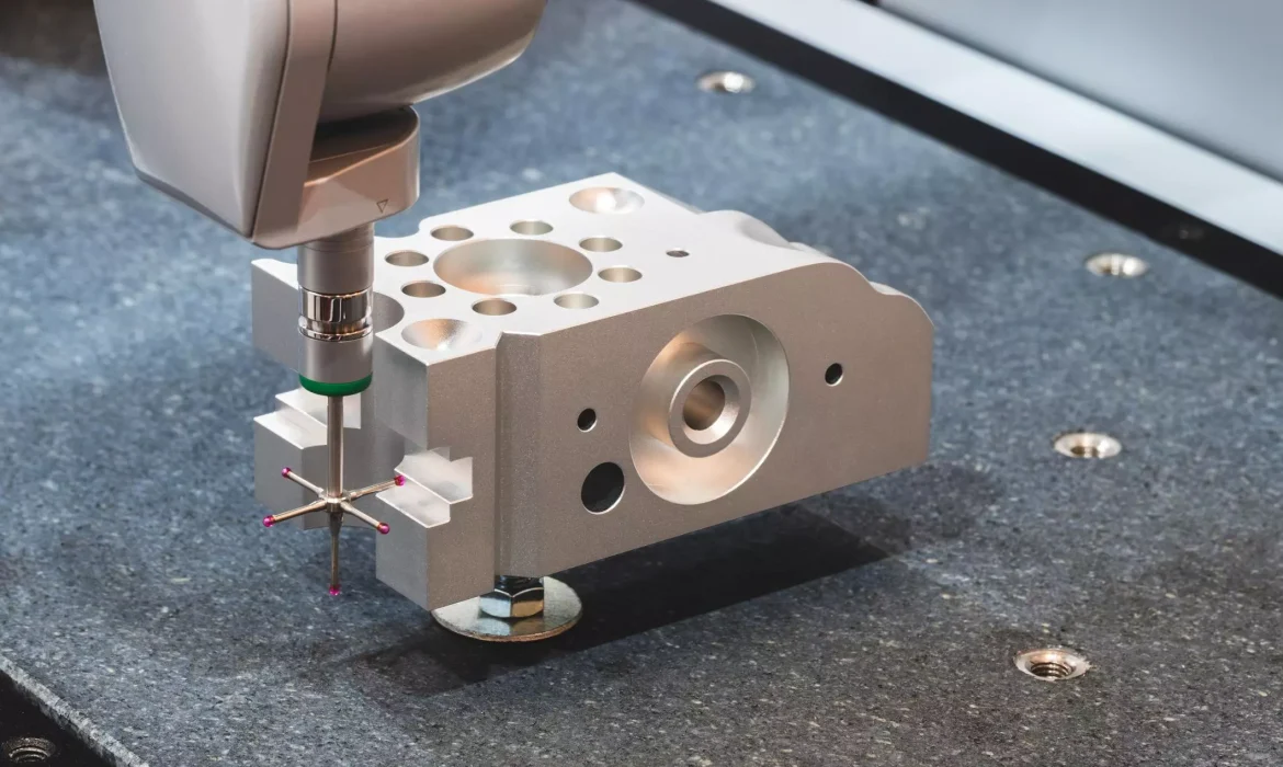 CMM inspection machine measuring a CNC machined metal part