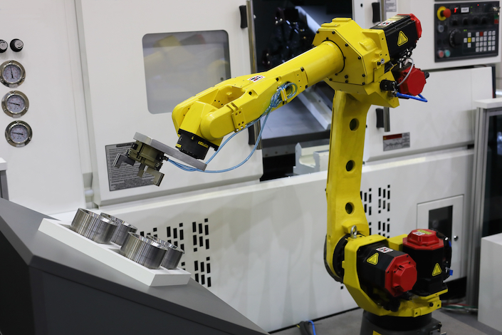 Automated CNC machining production line with robotic loading system