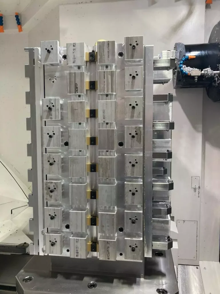 Tombstone fixture holding multiple parts in a horizontal machining center